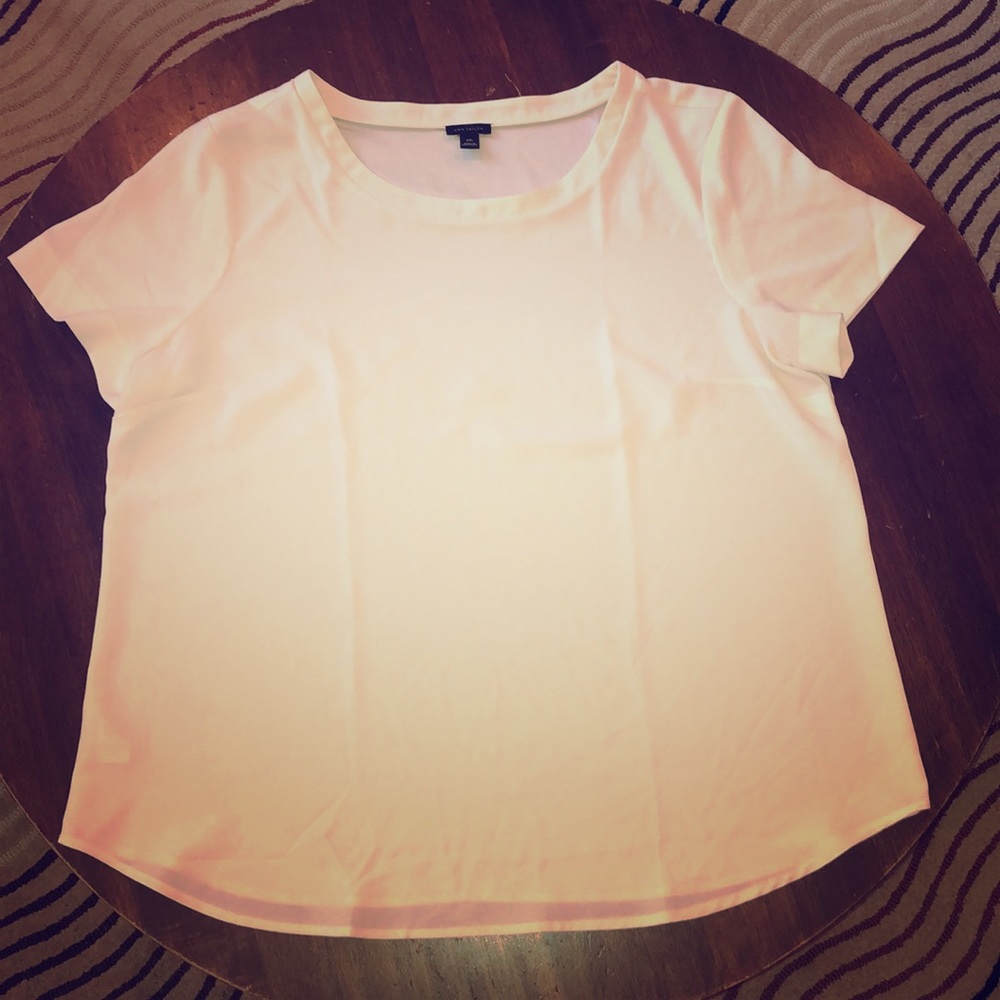 Women’s short sleeve blouse. White cream colored.